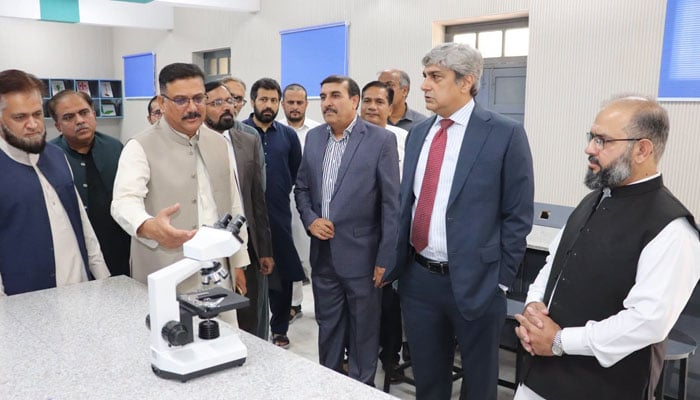 Education secretary Nadeem Mahbub (2nd right) visits the upgraded Physics, Chemistry and Biology labs at the Islamabad Model College of Boys F-8/4 on June 29, 2026. — Facebook@mofept