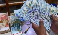 Rupee Edges Up