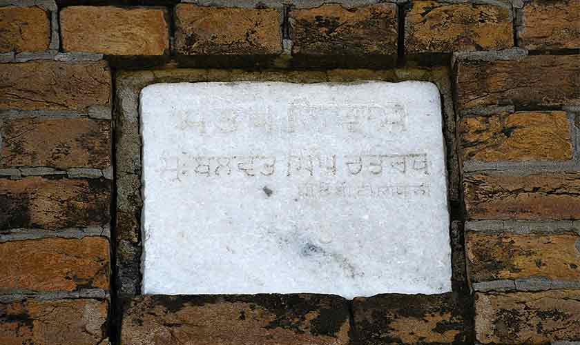 Inscription on the outer wall of the house of Santokh Singh in Karnali.