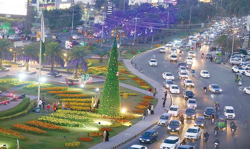 IN THE NAME OF INCLUSIVITY: A 42-foot Christmas tree was installed at Liberty Chowk, with great fanfare. — Photos by Rahat Dar