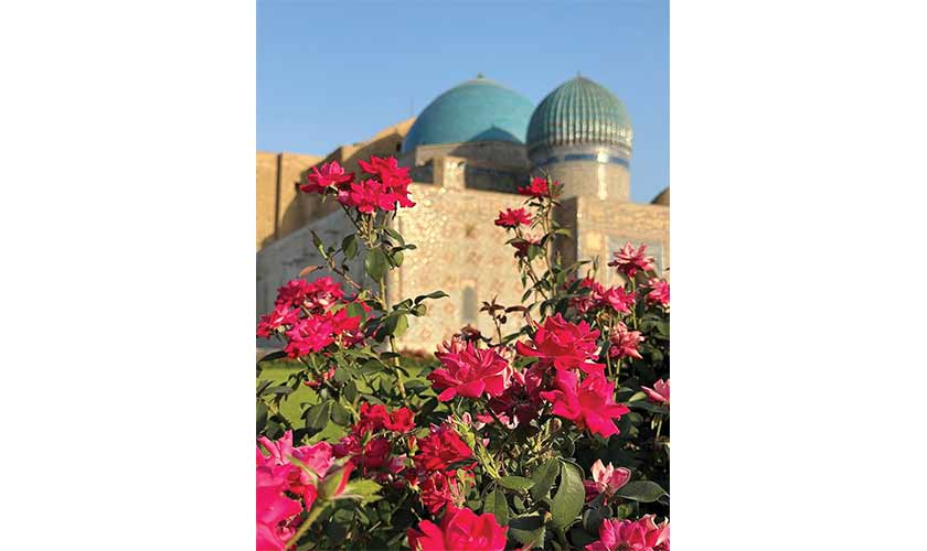 Khodja Ahmed Yasawi Mausoleum behind Red Roses.