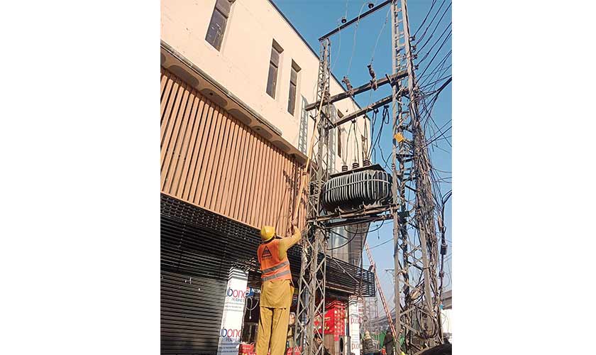 Power cables will be shifted underground, or properly aligned and secured overhead, significantly reducing the web of wires that has plagued the market for years. — Photo by the author