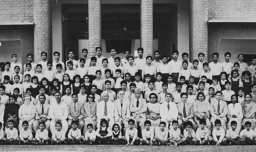 Mr RG pison sitting in the centre with Khan Anwar Sakinder wearing topi.