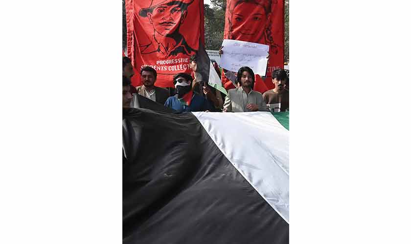 Before the students started walking, they unfurled four red sigils, each honouring a revolutionary.