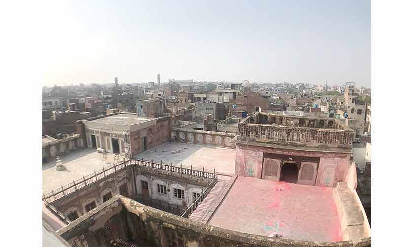 Haveli Nau Nihal Singh in Old Lahore, surrounded by the modern clutter of buildings. — Photos by the author