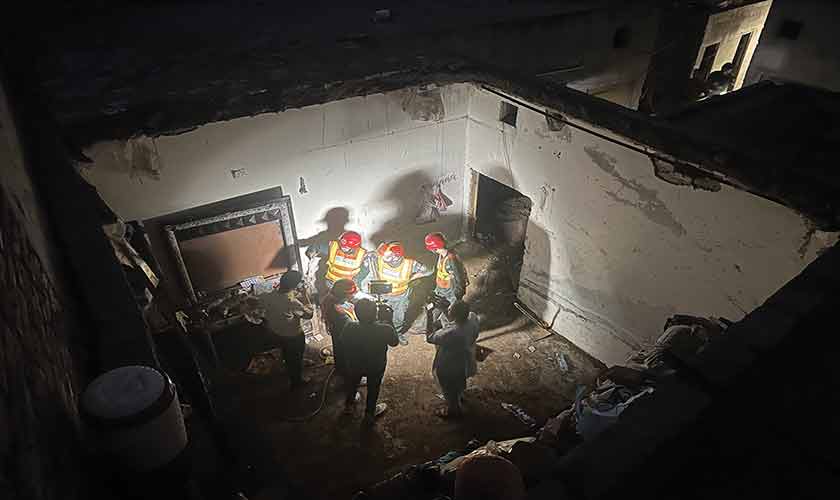 Reportedly, the Kahna building was under construction. Its concrete roof slab had been stripped of support shutters after just five days. — Photos by Rahat Dar