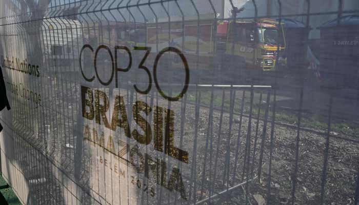 View of firefighters trucks from outside the COP30 UN Climate Change Conference in Belem, Para state, Brazil, on November 20, 2025, after a fire broke out in a pavilion.— AFP