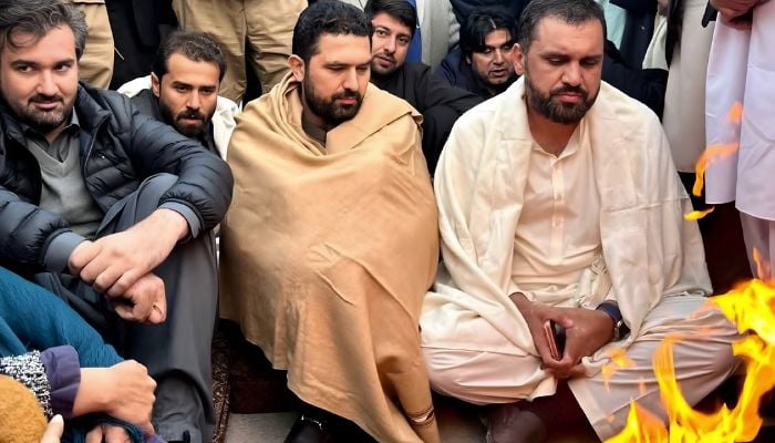 Khyber Pakhtunkhwa Chief Minister Sohail Afridi (centre) and others attending sit-in Adiala Road on November 28, 2025. X@PTIofficial