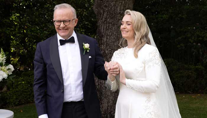 Australian Prime Minister Anthony Albanese (Left) and his new wife Jodie Haydon stand together during their wedding ceremony in Canberra on November 29, 2025.— AFP