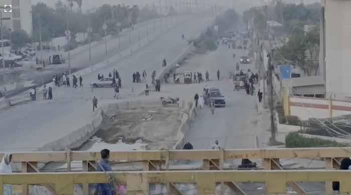 Rescuers recover body of minor boy 14 hours after falling into manhole near Karachi's Nipa