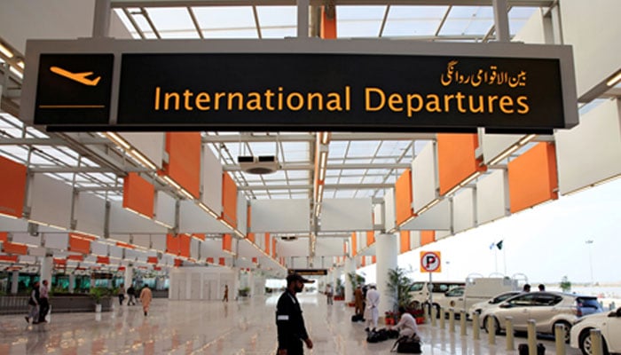 A worker walks at the departure area of the newly built Islamabad International Airport, during a media tour ahead of its official opening, Pakistan April 18, 2018. — Reuters