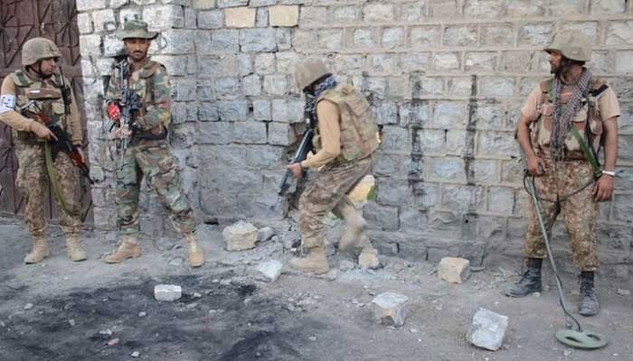 Pakistan Army soldiers are seen taking position during an operation. — ISPR/File