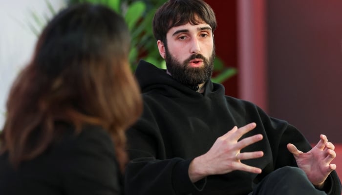 Aidan Gomez, Co-Founder & Chief Executive Officer at Cohere takes part in a conversation with Reuters Tech Correspondent Krystal Hu during the Reuters NEXT conference in New York City, US, December 4, 2025. — Reuters