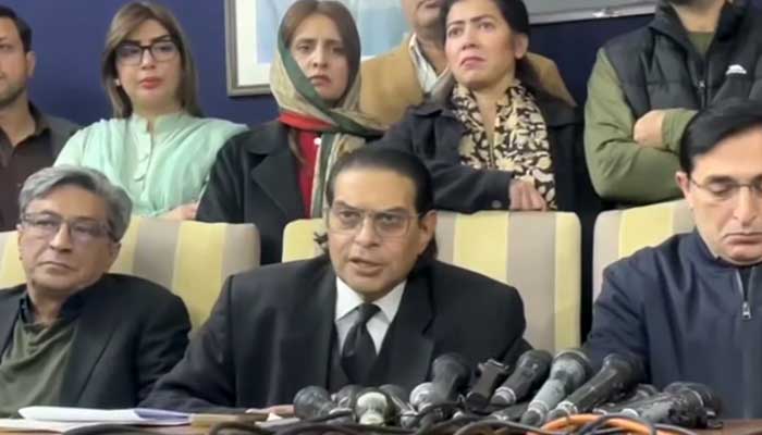 PTI Secretary General Salman Akram Raja (centre) addresses a press conference, December 6, 2025. — Screengrab via YouTube/Pakistan Tehreek-e-Insaf