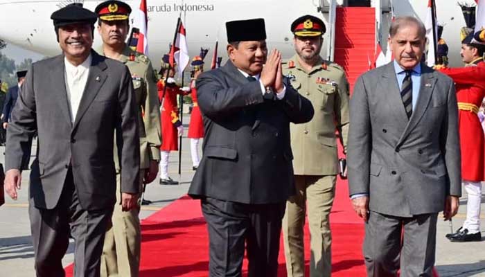 President Asif Ali Zardari and PM Shehbaz Sharif pictured with Indonesia President Prabowo Subianto upon his arrival on official visit at Nur Khan Airbase on December 8, 2025. — PID