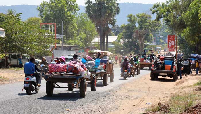 People flee amid clashes between Thailand and Cambodia along a disputed border area, in Oddar Meanchey Province, Cambodia, December 8, 2025. — Reuters