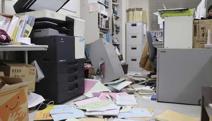 Bookshelves and documents that fell during an earthquake are seen at Kyodo News Hakodate bureau in Hakodate, Hokkaido, Japan, December 8, 2025.— Reuters