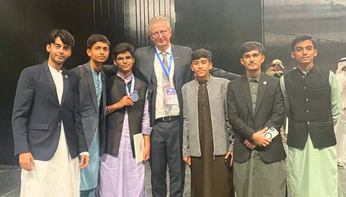 Pakistani students pose for a photo with President ISJO Emiel de Kleijn at ISJO 2025. — Facebook@BRCLOfficial