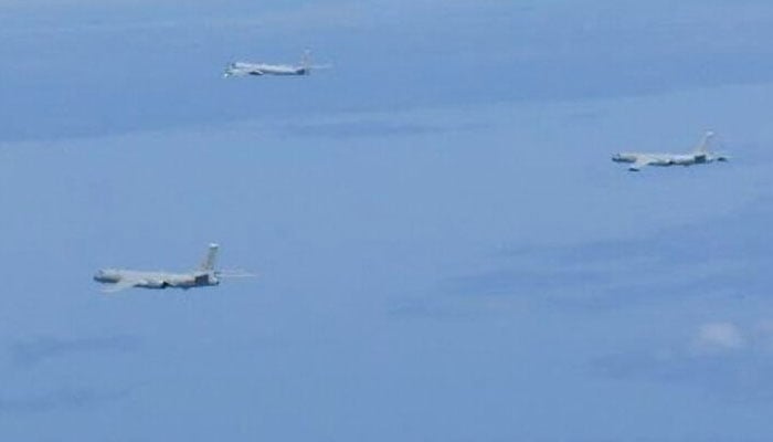 A Russian TU-95 bomber and Chinese H-6 bombers fly over East China Sea in this handout picture taken by Japan Air Self-Defence Force and released by the Joint Staff Office of the Defence Ministry of Japan May 24, 2022. — Reuters