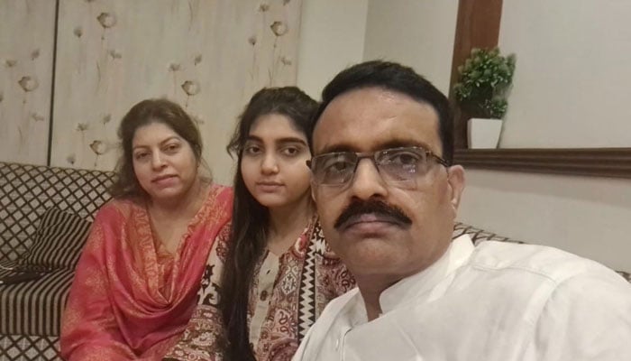 DSP Usman Haider (right) with his daugher (centre) and wife is seen in this file photo. — Reporter