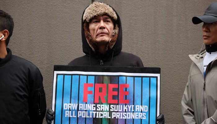 Kim Aris, the son of Aung San Suu Kyi, takes part in a protest rally organised by Myanmar people residing in Japan denouncing an upcoming election led by the military junta and demanding the immediate release of Myanmars detained former leader Aung San Suu Kyi and all political prisoners, outside Myanmars embassy in Tokyo, Japan, December 14, 2025. — Reuters