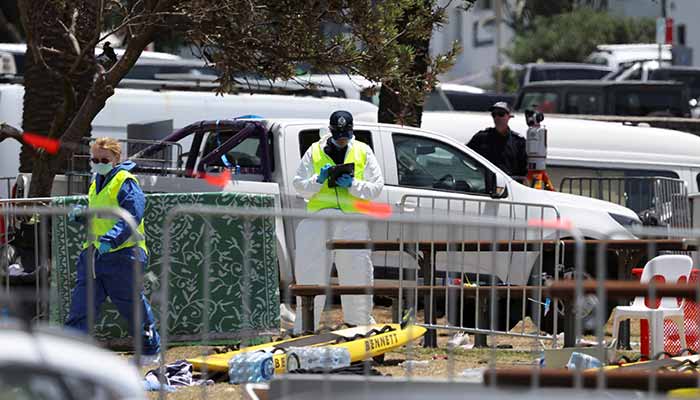 Members of the forensic team work at the scene of a shooting during a Jewish holiday celebration at Bondi Beach, in Sydney, Australia, December 15, 2025. — Reuters