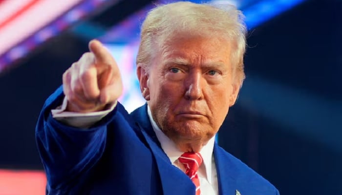 US President-elect Donald Trump gestures at Turning Point USAs AmericaFest in Phoenix, Arizona, US, December 22, 2024. — Reuters