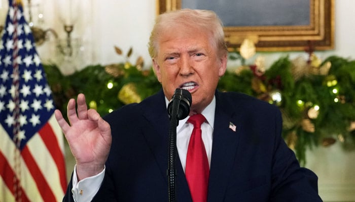 US President Donald Trump addresses the nation from the Diplomatic Reception Room of the White House in Washington, DC, on December 17, 2025. — Reuters