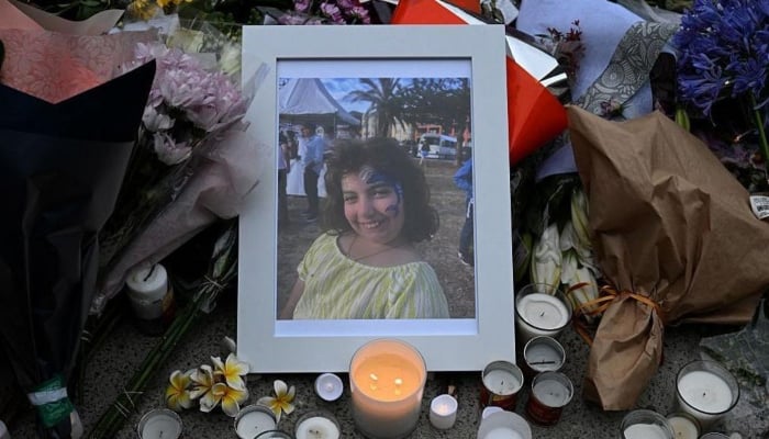 A portrait of 10-year-old Matilda, killed in a shooting, is displayed during a vigil at Bondi Pavilion in Sydney on December 16, 2025. — AFP