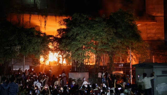 A group of people set fire to The Daily Star newspaper office building, following the death of Sharif Osman Hadi, a student leader who had been receiving treatment in Singapore after being shot in the head, in Dhaka, Bangladesh, December 19, 2025. — Reuters