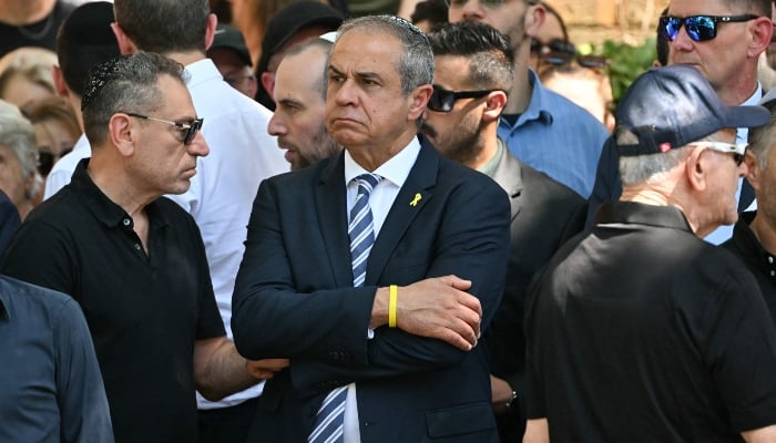 Israels Ambassador to Australia Amir Maimon (C) reacts after the funeral of Boris and Sofia Gurman, who were killed in the December 14 Bondi Beach shooting attack, in Sydney on December 19, 2025. — AFP