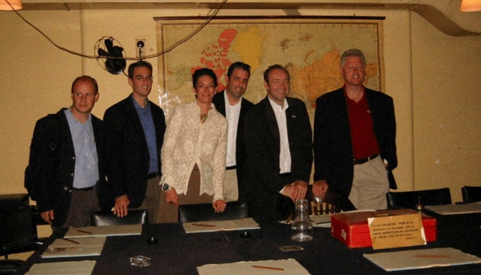 Former US president Bill Clinton and Ghislaine Maxwell are seen in this image from the estate of late financier and convicted sex offender Jeffrey Epstein, released by the Department of Justice in Washington, DC, US, on December 19, 2025. — Reuters