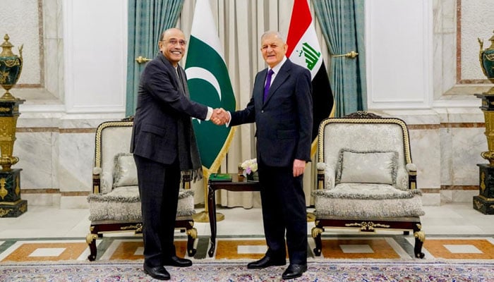 President Asif Ali Zardari shaking hands with his Iraqi counterpart Dr Abdul Latif Jamal Rashid during one-on meeting at Baghdad Palace on December 21, 2025. — PID