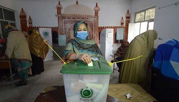 A woman casts her vote at a polling station. — Geo.tv/File