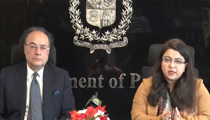 Finance Minister Muhammad Aurangzeb and Minister of State for Information Technology and Telecommunication (IT) Shaza Fatima Khawaja speak during a press conference on December 23, 2025. — Screengrab via Geo News