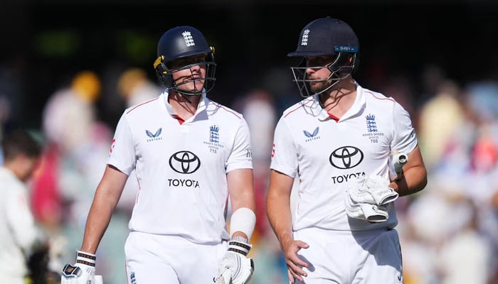 Englands Will Jacks and Jamie Smith walks off after the end of play during Ashes Test. — Reuters