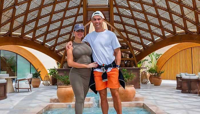 Cristiano Ronaldo poses with his fiancée Georgia Rodrigues at Ritz-Carlton Reserves Residence in Saudi Arabia. — Daily Mail
