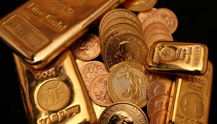UK gold bars and gold Sovereign coins are displayed at Baird & Co in Hatton Garden in London, Britain, October 8, 2025. — Reuters