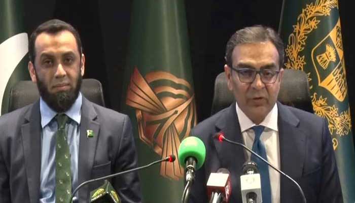 PMs Adviser on privatisation Muhammad Ali (right)and Federal Information Minister Atta Tarar addressing a press conference in Islamabad on December 24, 2025. — Screengrab Geo News