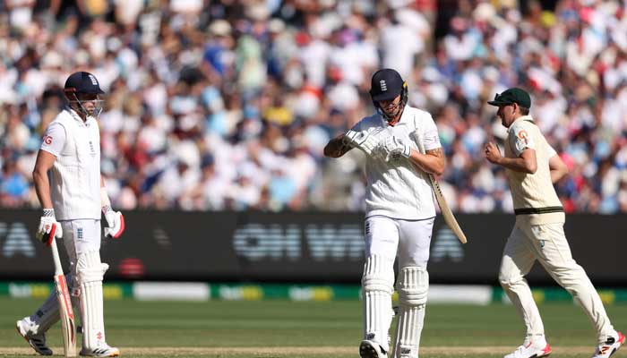 England´s Brydon Carse leaves the field after being dismissed during the first day of the fourth Ashes cricket Test match between Australia and England at the MCG on December 26, 2025. — AFP