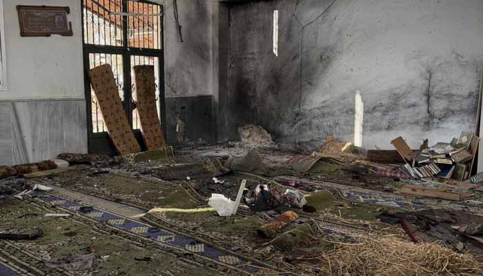 Interior of the Ali Bin Abi Talib Mosque in Homs shows extensive damage following a deadly explosion during Friday prayers, Homs, Syria, December 26, 2025. — Sana news agency
