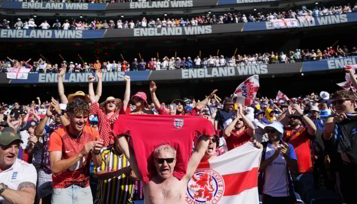 Members of the Barmy Army celebrate after England won the match, Melbourne Cricket Ground, Melbourne, Australia, December 27, 2025. — Reuters
