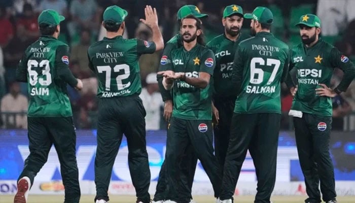 An undated image of Pakistan cricketers celebrating a wicket during a T20I match. — AFP
