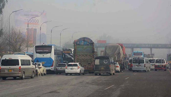 This representational image shows, large number of vehicles standing in queue at a motorway toll plaza. — APP/File
