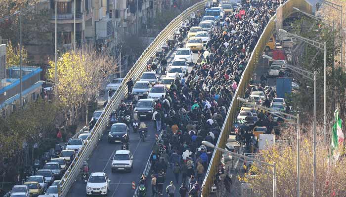 Shopkeepers and traders protest in the street against the economic conditions and Irans embattled currency in Tehran on December 29, 2025. — AFP