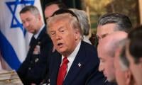 Trump says will 'eradicate' any Iranian arms build-up