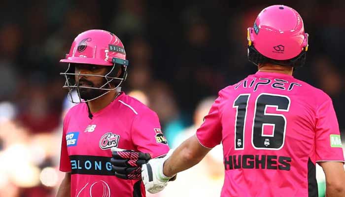 Pakistans batter Babar Azam (left) in action while representing Sydney Sixers against Melbourne Renegades during the Big Bash League 15. — Instagram/@BBL