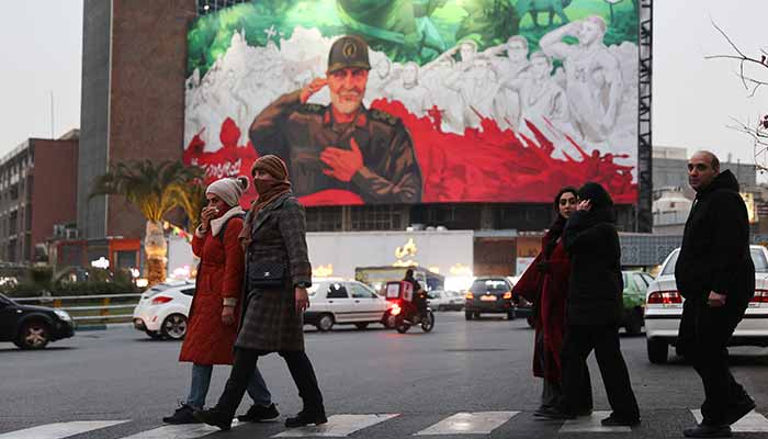 People walk on a street as protests erupt over the collapse of the currencys value in Tehran, Iran, January 2, 2026. — Reuters