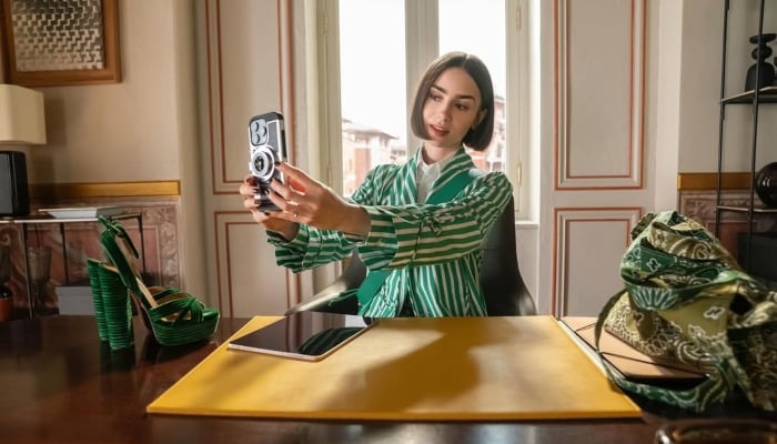 Actor Lily Collins can be seen potraying Emily Cooper in the hit show Emily in Paris. — Instagram/@emilyinparis