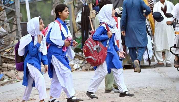 Students can be seen on their way to school in Islamabad on May 8, 2025. — APP